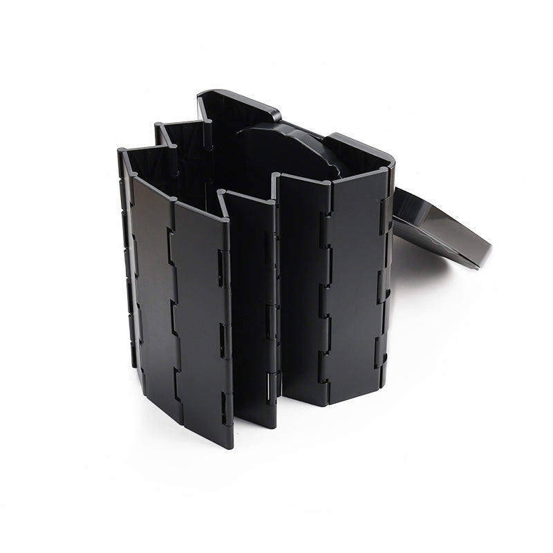 Black plastic for foldable toilet on a white background