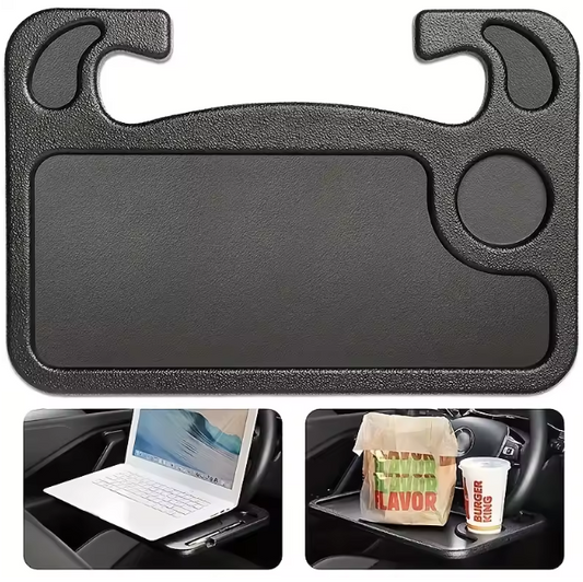 Black car tray with compartments for a laptop, food, and drink in a vehicle.