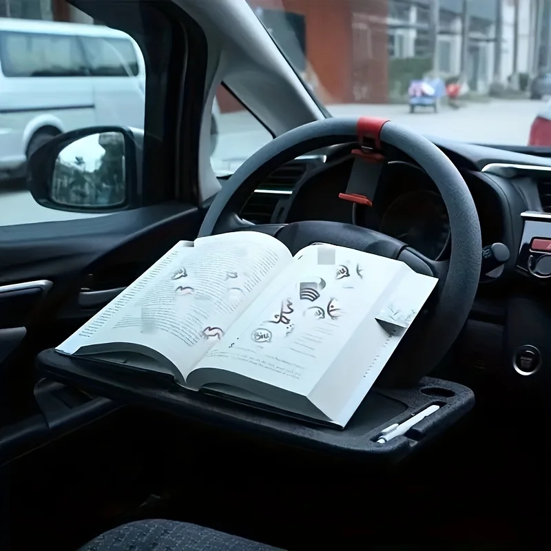 Car dashboard with a book holder holding an open book, placed on a car dashboard.