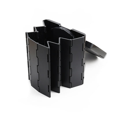 Black plastic for foldable toilet on a white background