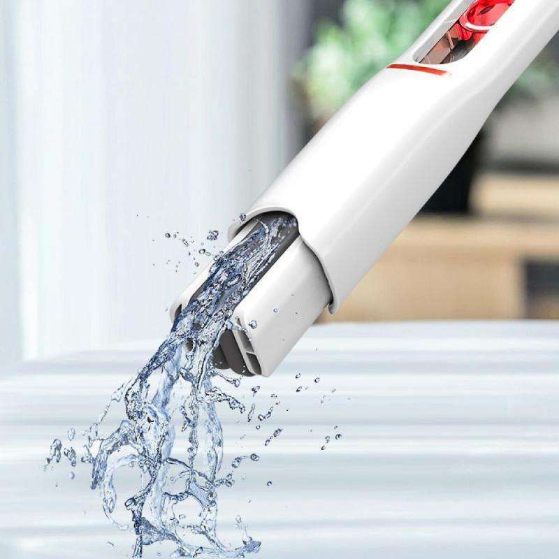 White water gun with water being sprayed against a blurred background